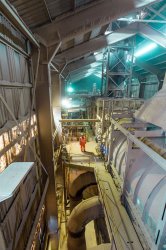 A view of the ‘new’ 1980s kiln, set inside the unusual kiln shed at the plant. Note plant worker for scale.