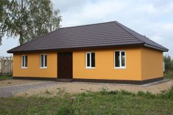 Affordable and sustainable housing for Africa, based on the prefabricated large wall element wood wool cement system.