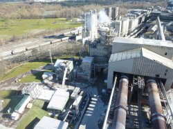 Looking down on a range of alternative fuel feeding equipment and expanded rail infrastructure from the pre-heater tower.