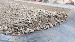 Crushed waste concrete is converted into clean aggregates, sand and RCP (shown) by Heidelberg Materials’ proprietary separation process.