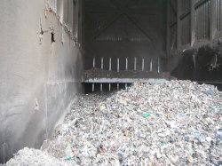 Fluffy RDF material from a local source. It is fed into the process under the ground from a new storage building that is perched on the side of the fjord. (Point 20 on the plant schematic).