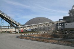 The plant's Temcor pre-blending storage dome flanked by a number of belt conveyors.