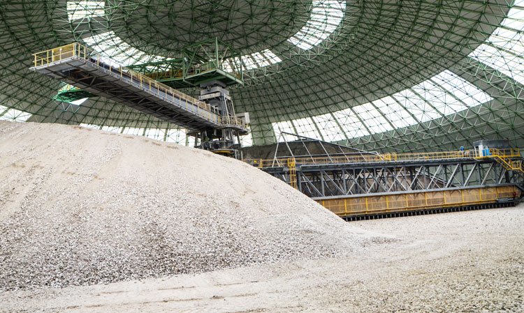 Inside the plant’s 50,000t circular premix storage facility, with a stacker-reclaimer from Bedeschi.