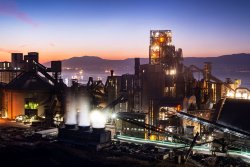 Overview of the Nuh Çimento plant at night.