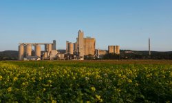 View of the Mannersdorf cement plant across neighbouring fields.