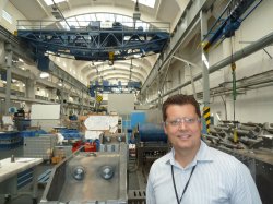 Tomas Zrostlik, managing director of Wikov Gear, in the assembly area. Note the designs in the background that the staff use to assemble the gearboxes by hand.